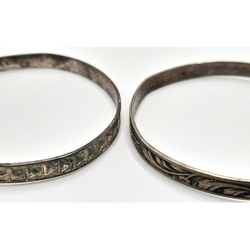 1644 - 2X vintage sterling silver adjustable bangles with ornate engravings. Total weight 10.3G. Please see... 