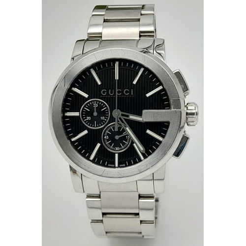 745 - A Designer Gucci Chronograph Quartz Gents Watch. Stainless steel bracelet and case - 44mm. Black dia... 