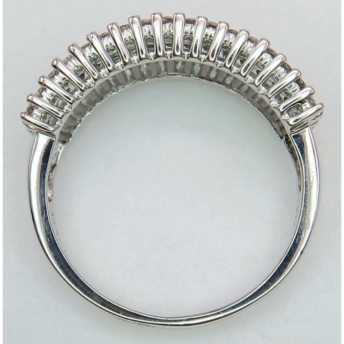 1272 - A 9K White Gold Diamond Four Row Ring. 0.75ctw of diamonds. Size O. 3.7g total weight. Ref: 019247