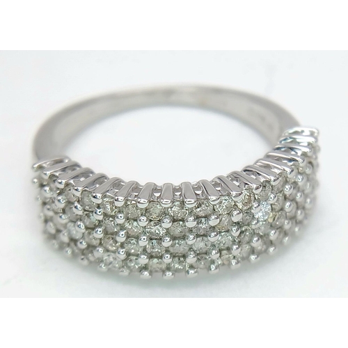 1272 - A 9K White Gold Diamond Four Row Ring. 0.75ctw of diamonds. Size O. 3.7g total weight. Ref: 019247