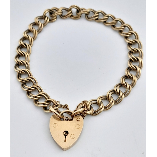 1552 - A Vintage 9K Yellow Gold Double Link Bracelet with Heart Clasp. 16cm. 14.4g.