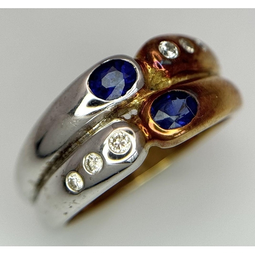 1117 - A Two-Tone 18K Gold, Sapphire and Diamond Ring. Graduating diamonds meet oval sapphires on yellow an... 