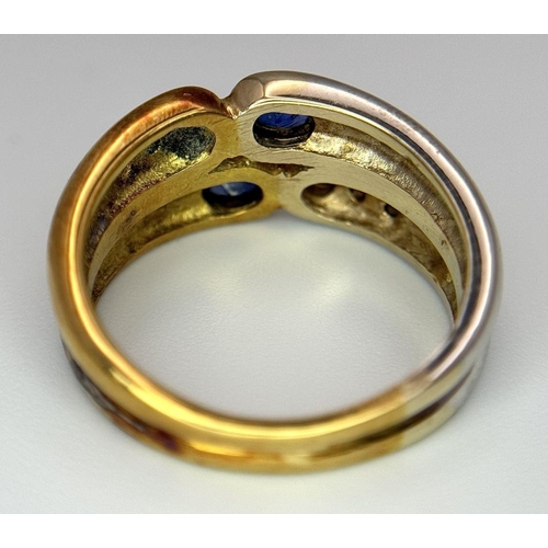 1117 - A Two-Tone 18K Gold, Sapphire and Diamond Ring. Graduating diamonds meet oval sapphires on yellow an... 