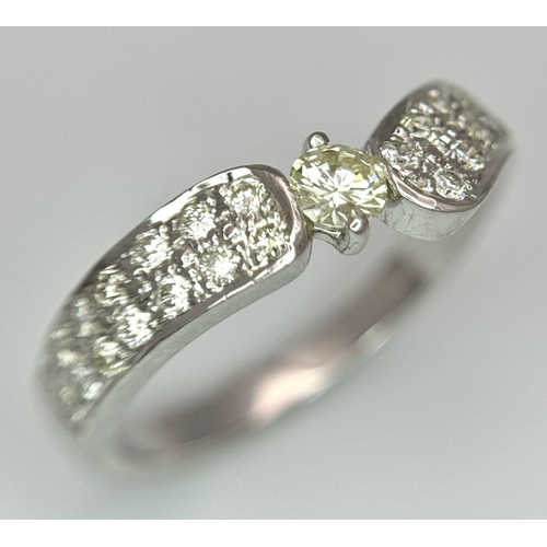 137 - AN 18K WHITE GOLD DIAMOND RING - 0.55CT. 3.9G. SIZE M.
SC5064.