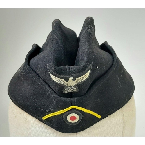 138 - A WW2 German Panzer M34 Side Cap with Yellow Soutache for Reconnaissance. Makers name August Schelle... 