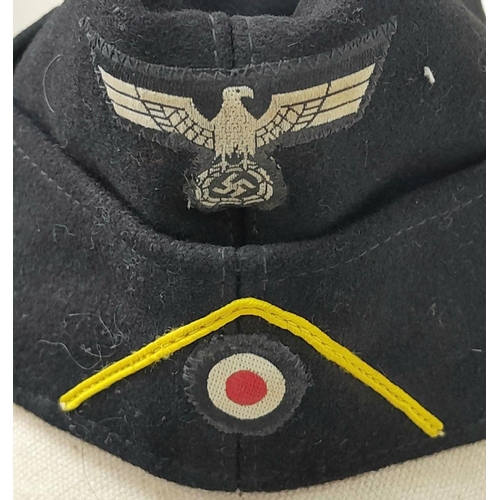 138 - A WW2 German Panzer M34 Side Cap with Yellow Soutache for Reconnaissance. Makers name August Schelle... 