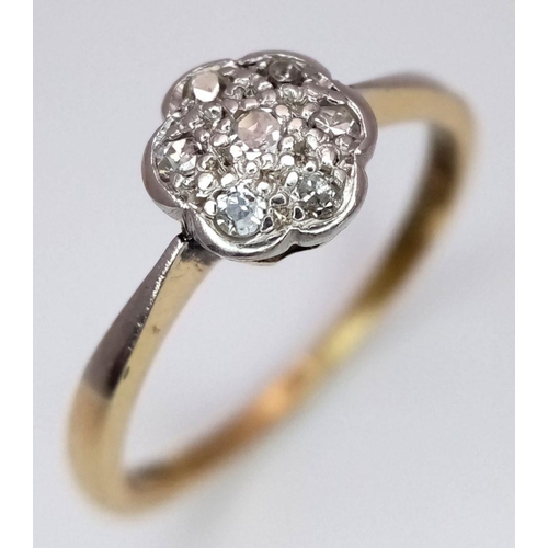 144 - AN 18K YELLOW GOLD AND PLATINUM VINTAGE DIAMOND CLUSTER RING. 3G. SIZE R. SC5065