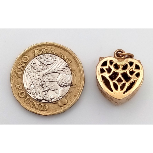 158 - A 9K YELLOW GOLD HEART SHAPED BOX CHARM/PENDANT - WHICH OPENS TO REVEAL A STONE SET RING INSIDE - ON... 