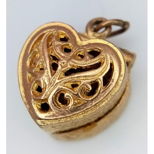 158 - A 9K YELLOW GOLD HEART SHAPED BOX CHARM/PENDANT - WHICH OPENS TO REVEAL A STONE SET RING INSIDE - ON... 