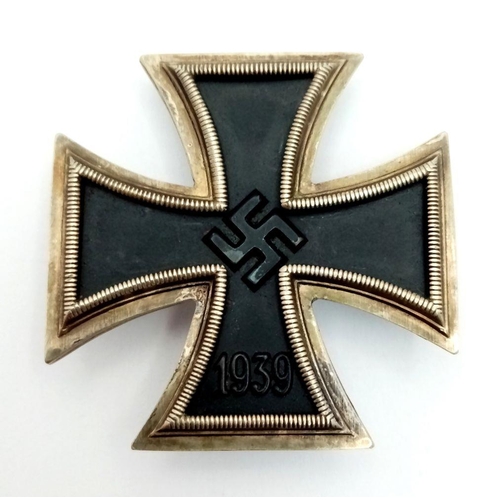 180 - A WW2 German Iron Cross 1st Class. Makers Marked L.15 for Friedrich Orth, Wien. Typical 3 part const... 