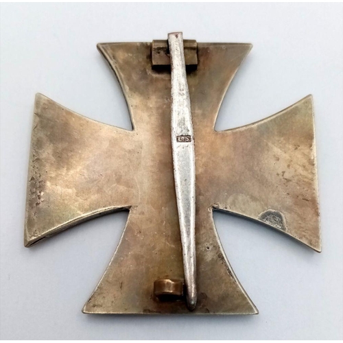 180 - A WW2 German Iron Cross 1st Class. Makers Marked L.15 for Friedrich Orth, Wien. Typical 3 part const... 