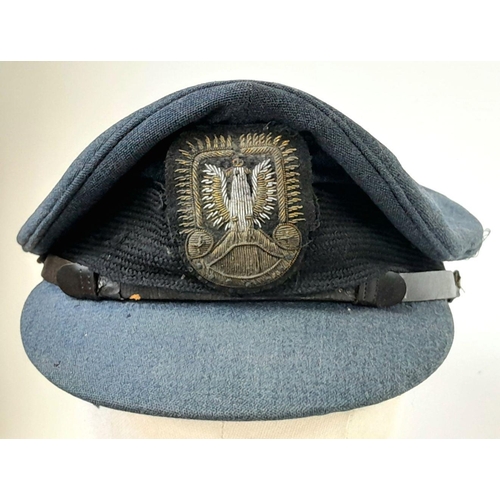 215 - A WW2 Polish Airforce in Exile Pilots Peaked Cap. A British RAF Cap with a Polish Officers Bullion B... 