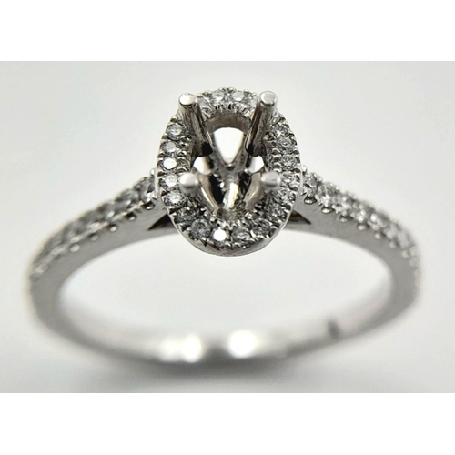 265 - A PLATINUM HALO DIAMOND SET RING MOUNT READY TO SET YOUR DREAM STONE IN - TAKES A 0.25CT STONE APPRO... 