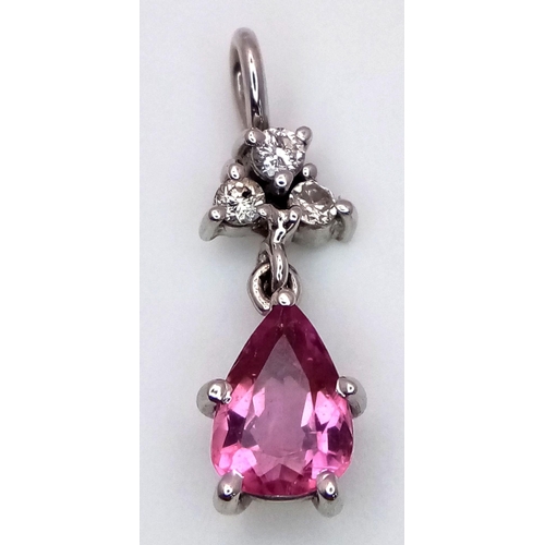 296 - A Delightful Pink Sapphire and Diamond Petit Pendant - Set in platinum. 2cm. 1.5g total weight.