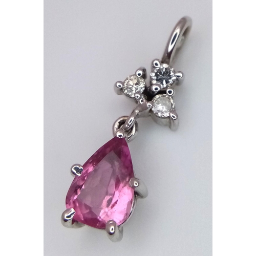 296 - A Delightful Pink Sapphire and Diamond Petit Pendant - Set in platinum. 2cm. 1.5g total weight.