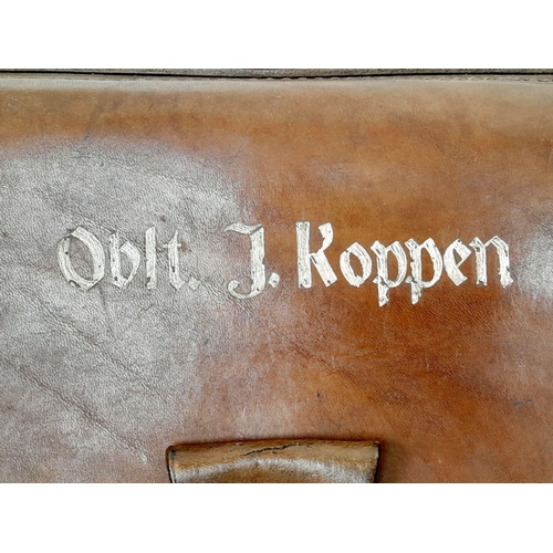 308 - A WW2 German Luftwaffe Briefcase. Named to Oberleutnant J. Koppen. Nice Luftwaffe mark on the clasp.