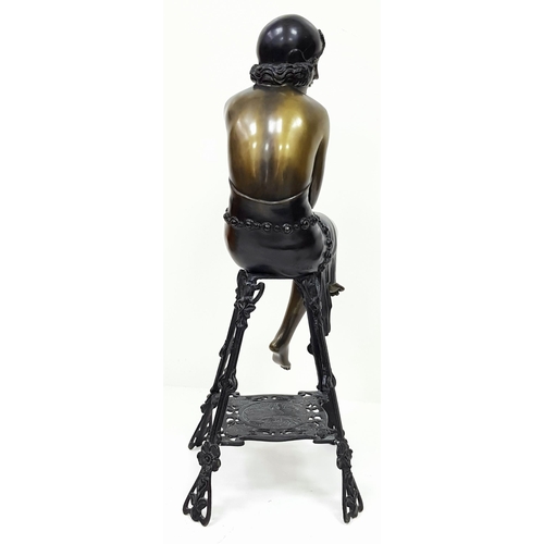 309 - A Vintage Bronze of a Stylish Art Deco Woman Holding a Champagne Glass - seated on a decorative stoo... 