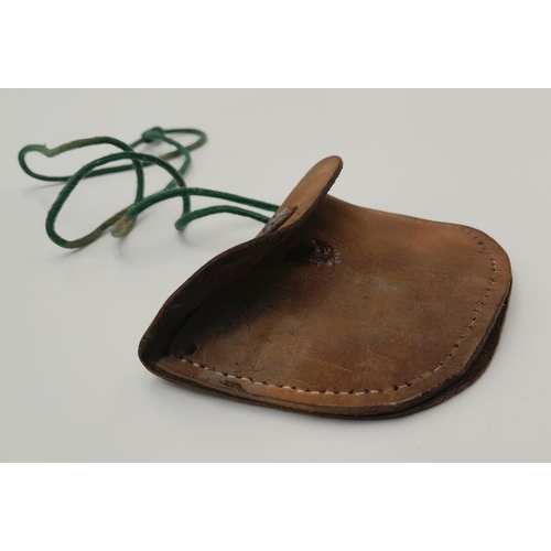 356 - A WW2 German Mountain Troop Soldiers Dog Tag in a leather Pouch to prevent the cold metal from touch... 