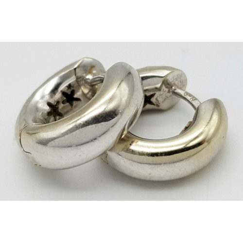 359 - A Pair of 18K White Gold Small Hoop Earrings. Clip open design. 12mm. 5.6g total weight.