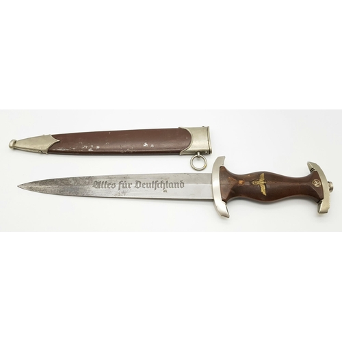 48 - A 3rd Reich SA Dagger. Rzm Marked M7/2 for the manufacturer Emil Voos Waffen Fabrik Solingen. A slig... 