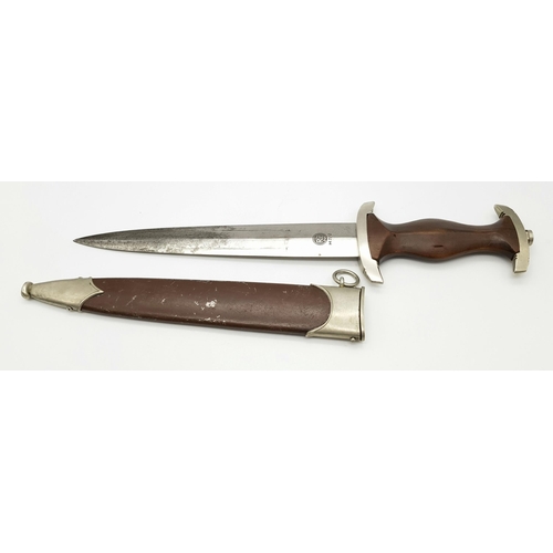 48 - A 3rd Reich SA Dagger. Rzm Marked M7/2 for the manufacturer Emil Voos Waffen Fabrik Solingen. A slig... 