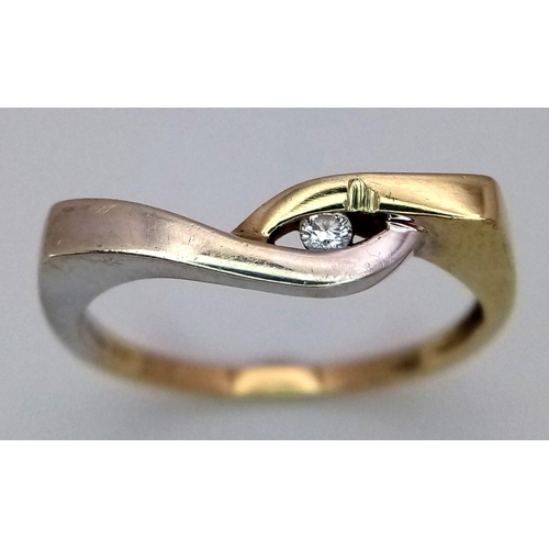 522 - A 9K TWO COLOUR DIAMOND SET TWIST DESIGN RING - 2G. SIZE N. SC5006.