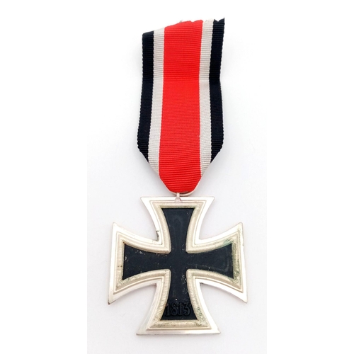 552 - A Late WW2 German Iron Cross 2nd Class. Unissued condition. Ring Marked L/15 for the maker Otto Shic... 