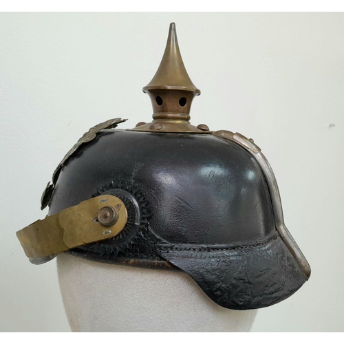 62 - A WW1 Imperial Prussian Infantry Nco’s Pickelhaube. With Cockades and chin strap. Marked “B.J.A