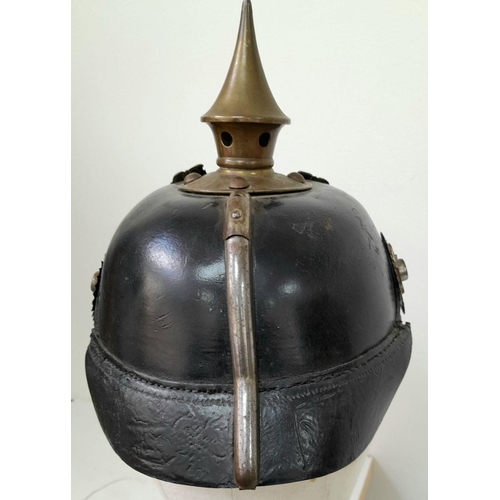 62 - A WW1 Imperial Prussian Infantry Nco’s Pickelhaube. With Cockades and chin strap. Marked “B.J.A