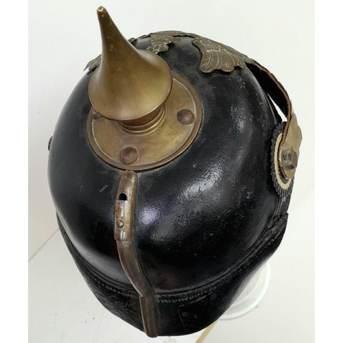 62 - A WW1 Imperial Prussian Infantry Nco’s Pickelhaube. With Cockades and chin strap. Marked “B.J.A