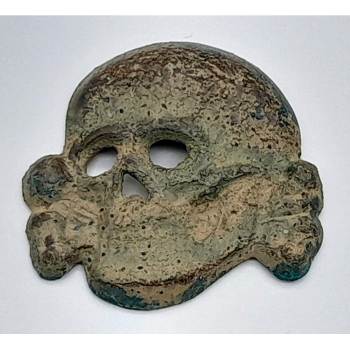 639 - A WW2 Relic Waffen SS Deaths Head Skull Cap Badge. Metal Detecting Find from Russia.