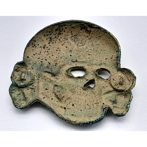 639 - A WW2 Relic Waffen SS Deaths Head Skull Cap Badge. Metal Detecting Find from Russia.