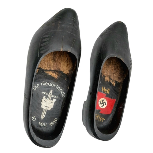 692 - A WW2 German Trench Art. A pair of Dutch Souvenir Clogs, dedicated to the Invasion of Holland by the... 