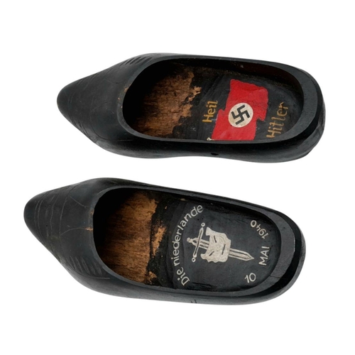 692 - A WW2 German Trench Art. A pair of Dutch Souvenir Clogs, dedicated to the Invasion of Holland by the... 