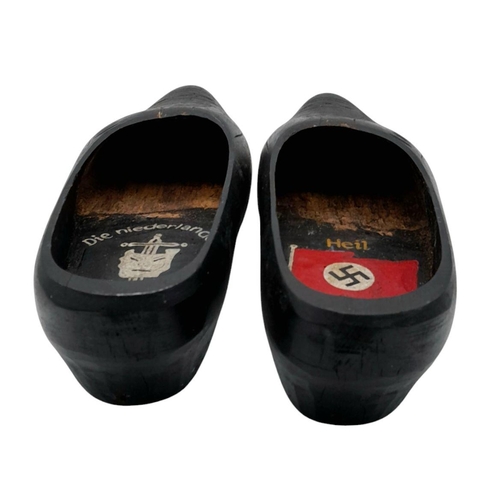 692 - A WW2 German Trench Art. A pair of Dutch Souvenir Clogs, dedicated to the Invasion of Holland by the... 