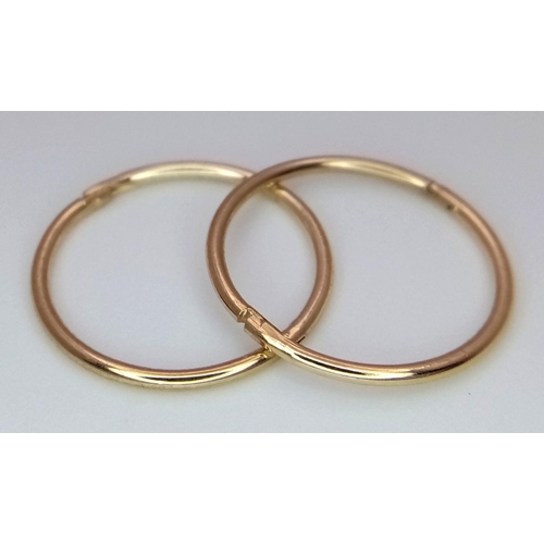 754 - A PAIR OF 9K YELLOW GOLD MINI HOOP SLEEPER EARRINGS .0.8G. SC5013