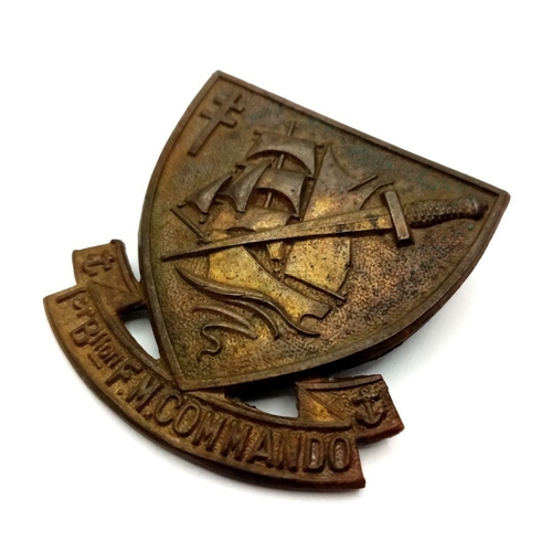 755 - A WW2 British Made Free French Commandos Beret Badge.