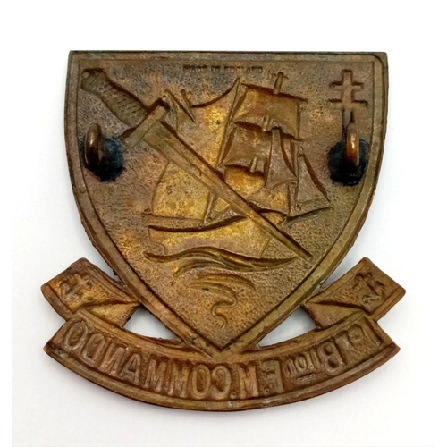 755 - A WW2 British Made Free French Commandos Beret Badge.