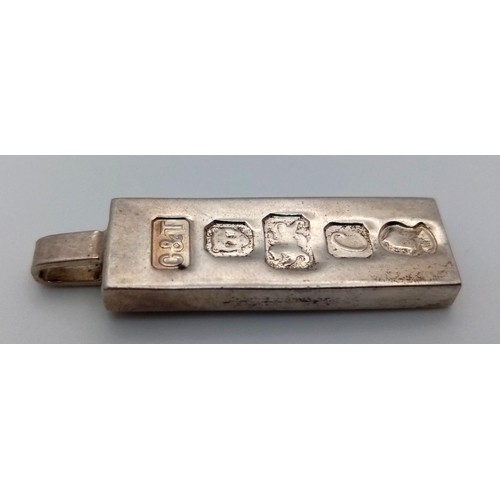 860 - A STERLING SILVER INGOT PENDANT- FULL HALLMARK ON FRONT. 14.2G. 3.5CM. SC5085