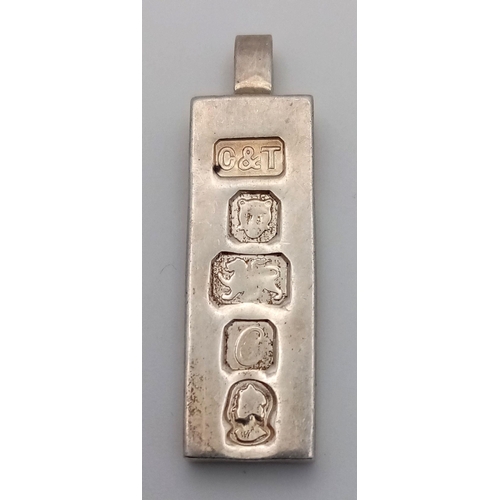 860 - A STERLING SILVER INGOT PENDANT- FULL HALLMARK ON FRONT. 14.2G. 3.5CM. SC5085