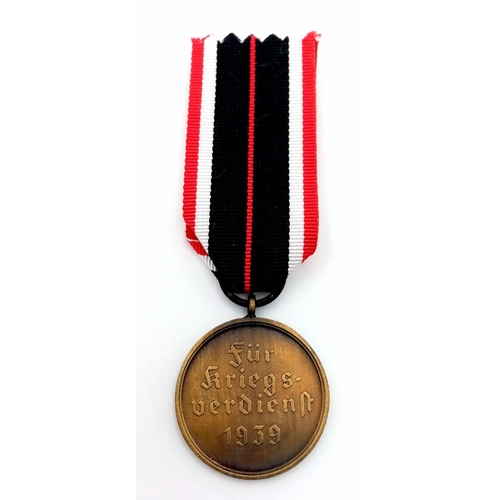 925 - A 3rd Reich Kriegsverdienstmedaille (War Merit Medal) a military decoration awarded to recognise out... 