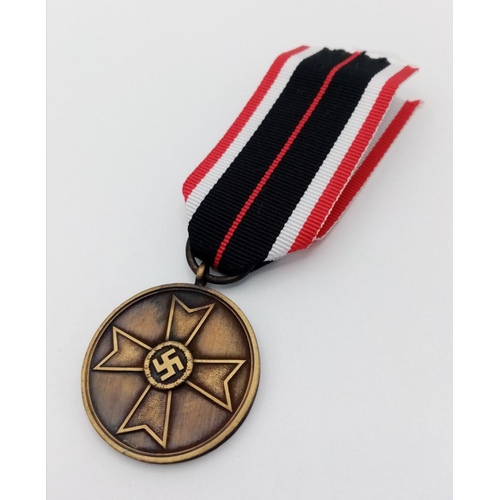 925 - A 3rd Reich Kriegsverdienstmedaille (War Merit Medal) a military decoration awarded to recognise out... 