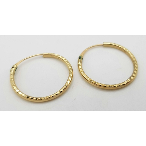 1017 - Two 9K Yellow Gold Pairs of Small Hoop Earrings. 0.65g