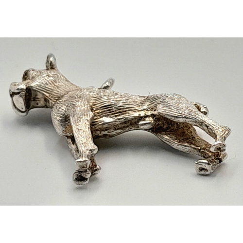 1070 - A STERLING SILVER BOXER DOG CHARM.  6.5G