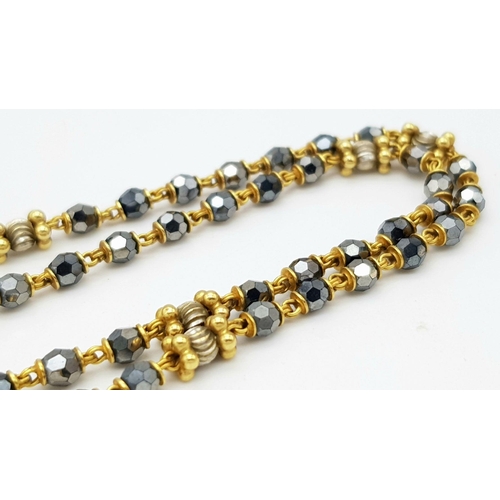 1088 - A 22K Gold Necklace with Faceted Glass Spacers. 36cm length. 10.6g total weight.