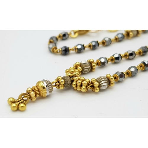 1088 - A 22K Gold Necklace with Faceted Glass Spacers. 36cm length. 10.6g total weight.