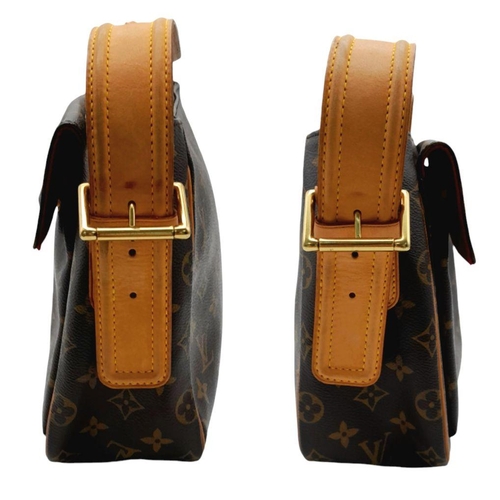 122 - A Louis Vuitton Viva Cite Shoulder Bag. Coated LV canvas exterior with two large pockets. Gold tone ... 