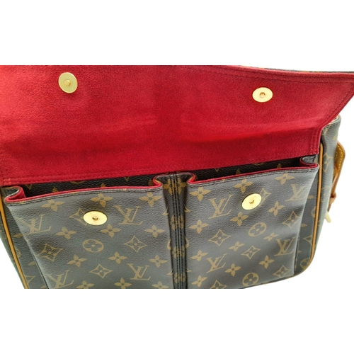 122 - A Louis Vuitton Viva Cite Shoulder Bag. Coated LV canvas exterior with two large pockets. Gold tone ... 