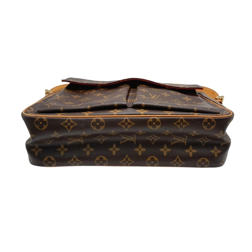 122 - A Louis Vuitton Viva Cite Shoulder Bag. Coated LV canvas exterior with two large pockets. Gold tone ... 