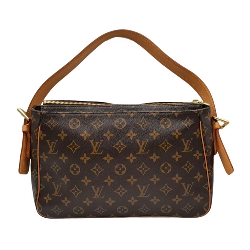 122 - A Louis Vuitton Viva Cite Shoulder Bag. Coated LV canvas exterior with two large pockets. Gold tone ... 